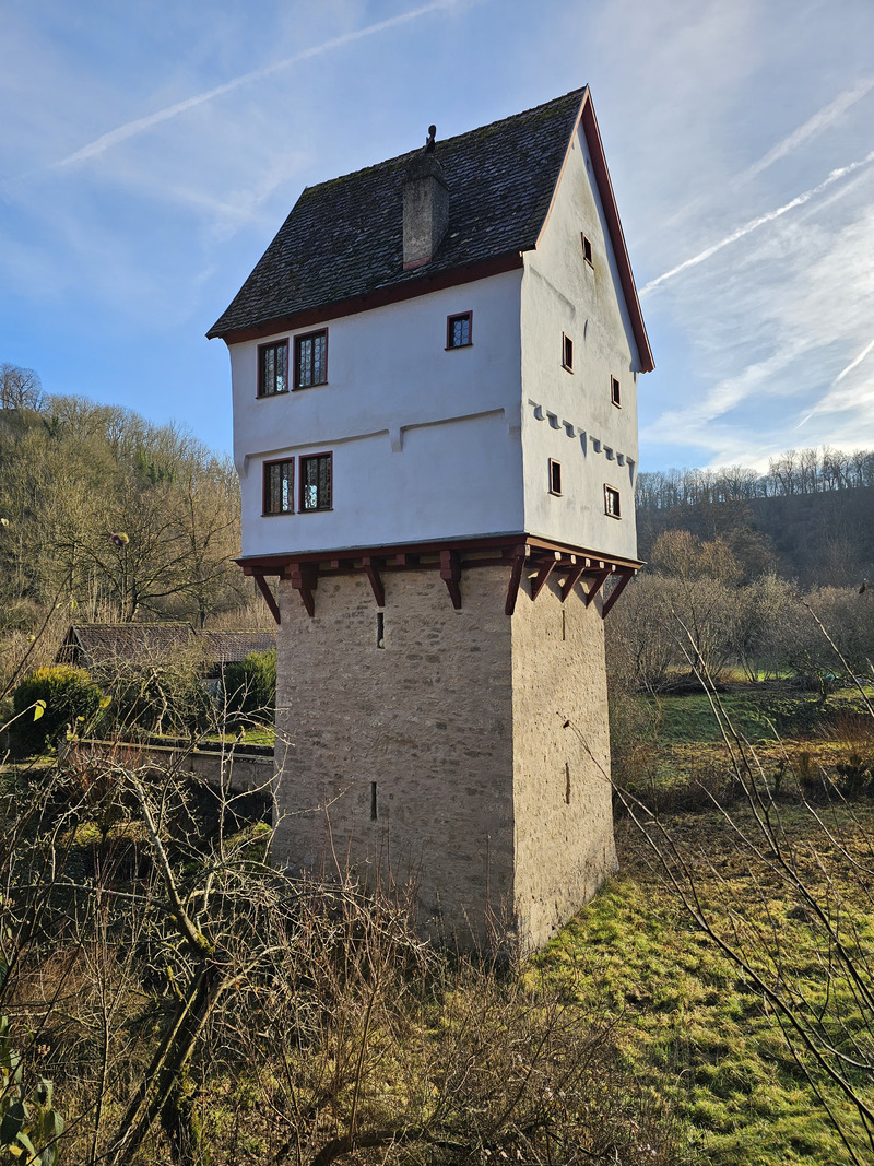 A house on a two story stone tower