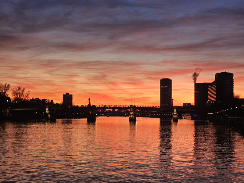 A sunset over the river in Frankfurt