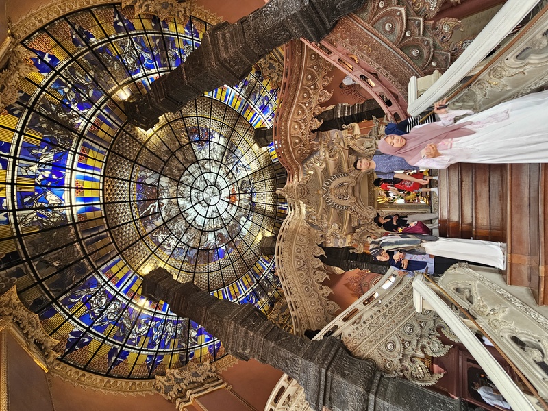 Staircase and stained-glass dome inside the Erawan Museum in Bangkok