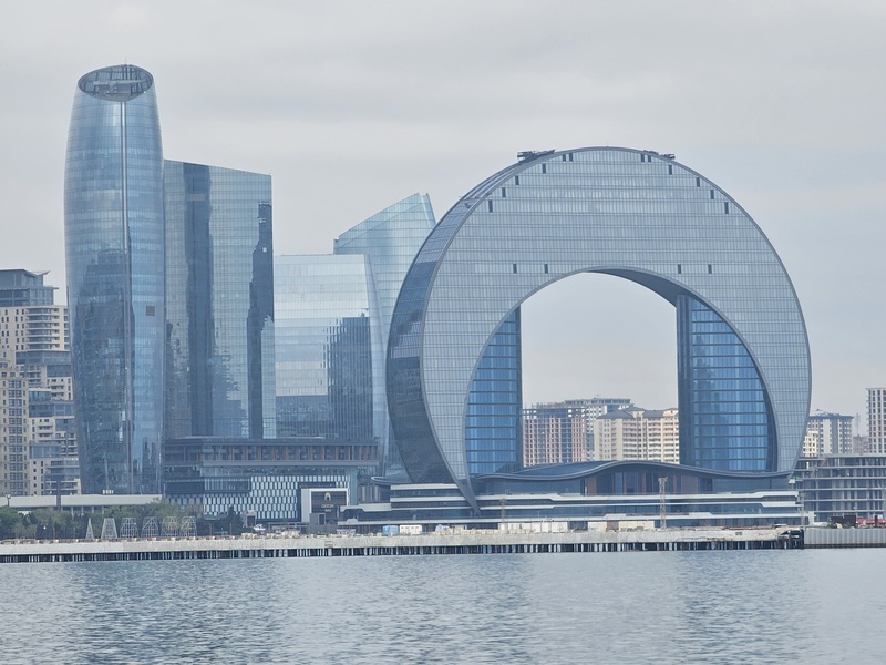 A view of the Crescent Hotel in Baku, Azerbaijan, with the Caspian Sea in the foreground.