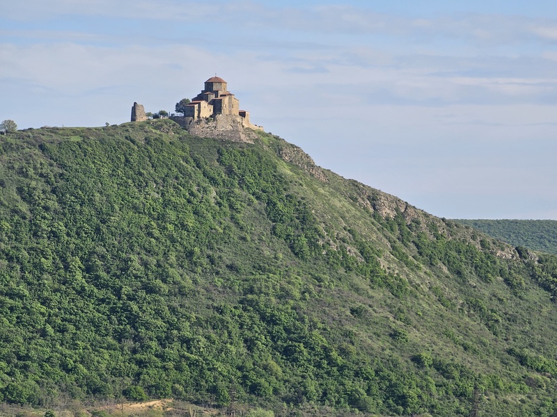 Jvari Monastery perched atop a lush green hill overlooking the old capital Mtskheta, Georgia