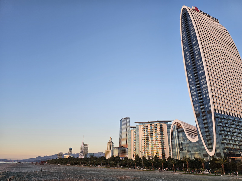 Batumi beachfront skyline at sunset with the Marriott tower and modern high-rises