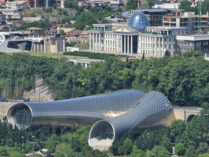 Rike Park Concert Hall and hillside buildings in Tbilisi, Georgia